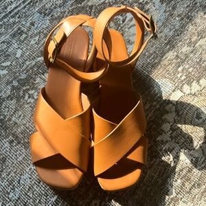 Madewell wooden platform ankle strap sandals.